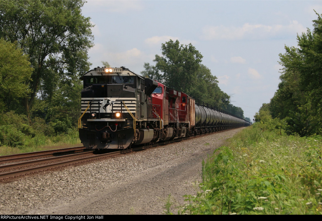 Racing west, NS 7278 leads a double 67X empty ethanol train